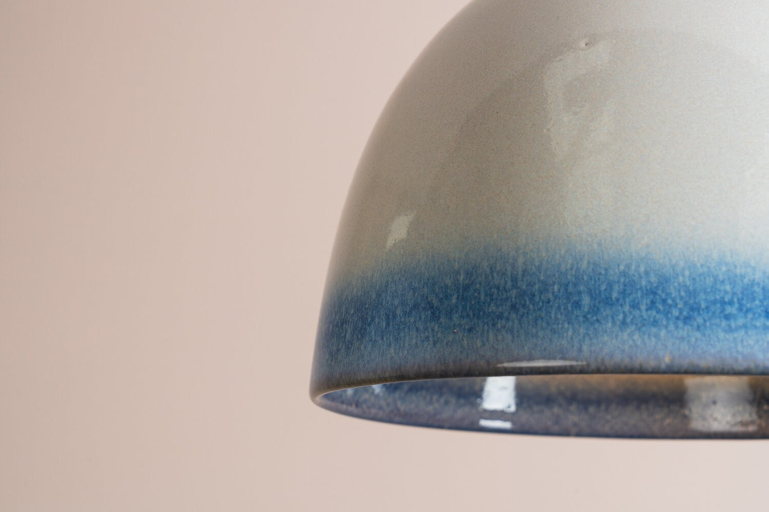 Element flush mount ceiling light in ceramic and oak with a blue and white gloss glaze by StudioHaran