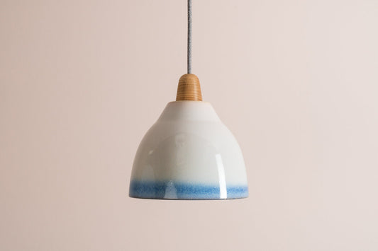 Element pendant with a blue and white gloss glaze by StudioHaran