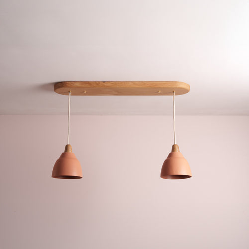 Large wooden pendant light fixture with two terracotta pendant lights