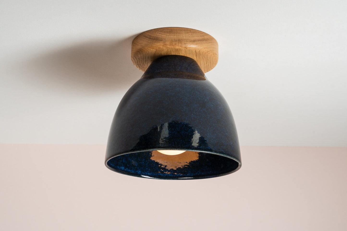 Element flush mount ceiling light in ceramic and oak with a Laguna blue glaze by StudioHaran