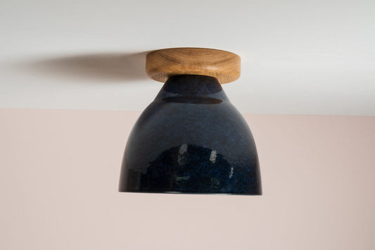 Element flush mount ceiling light in ceramic and oak with a Laguna blue glaze by StudioHaran